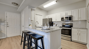 Kitchen with white cabinets at Limestone Ranch, Lewisville, 75067
